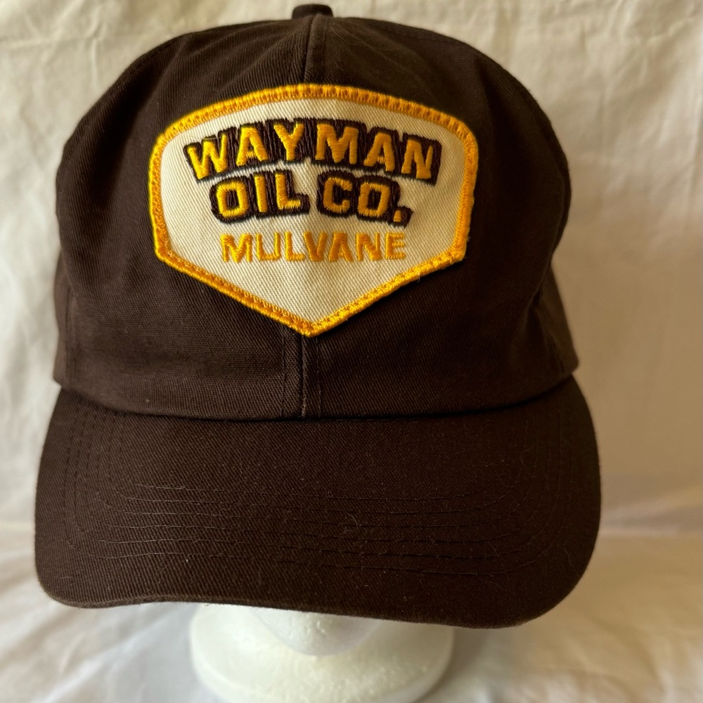 Vintage K-branded brown oil CO hat with old school ear flaps.